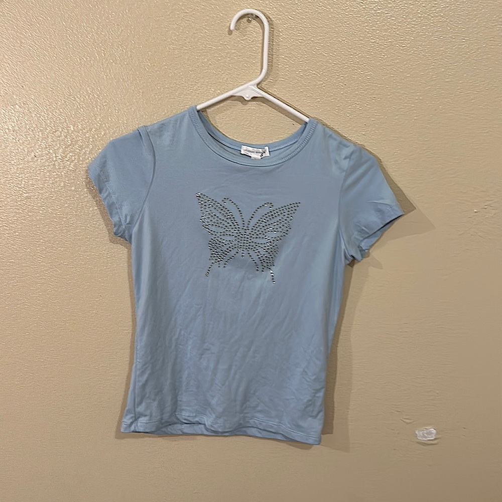 A blue shirt with a diamond butterfly print. by  orange kiss. A large.